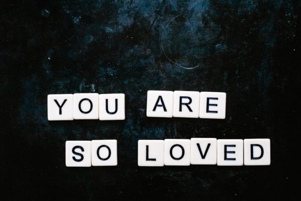 You are so loved spelt out using Scrabble letters flatlay
