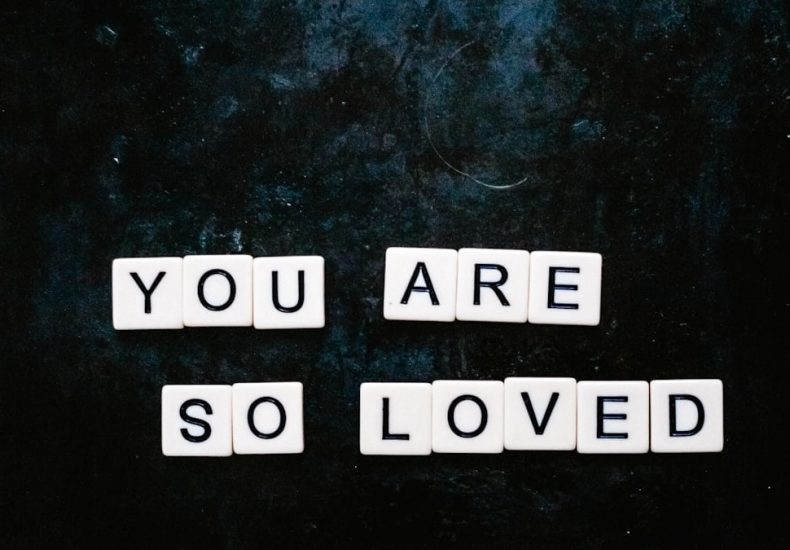 You are so loved spelt out using Scrabble letters flatlay